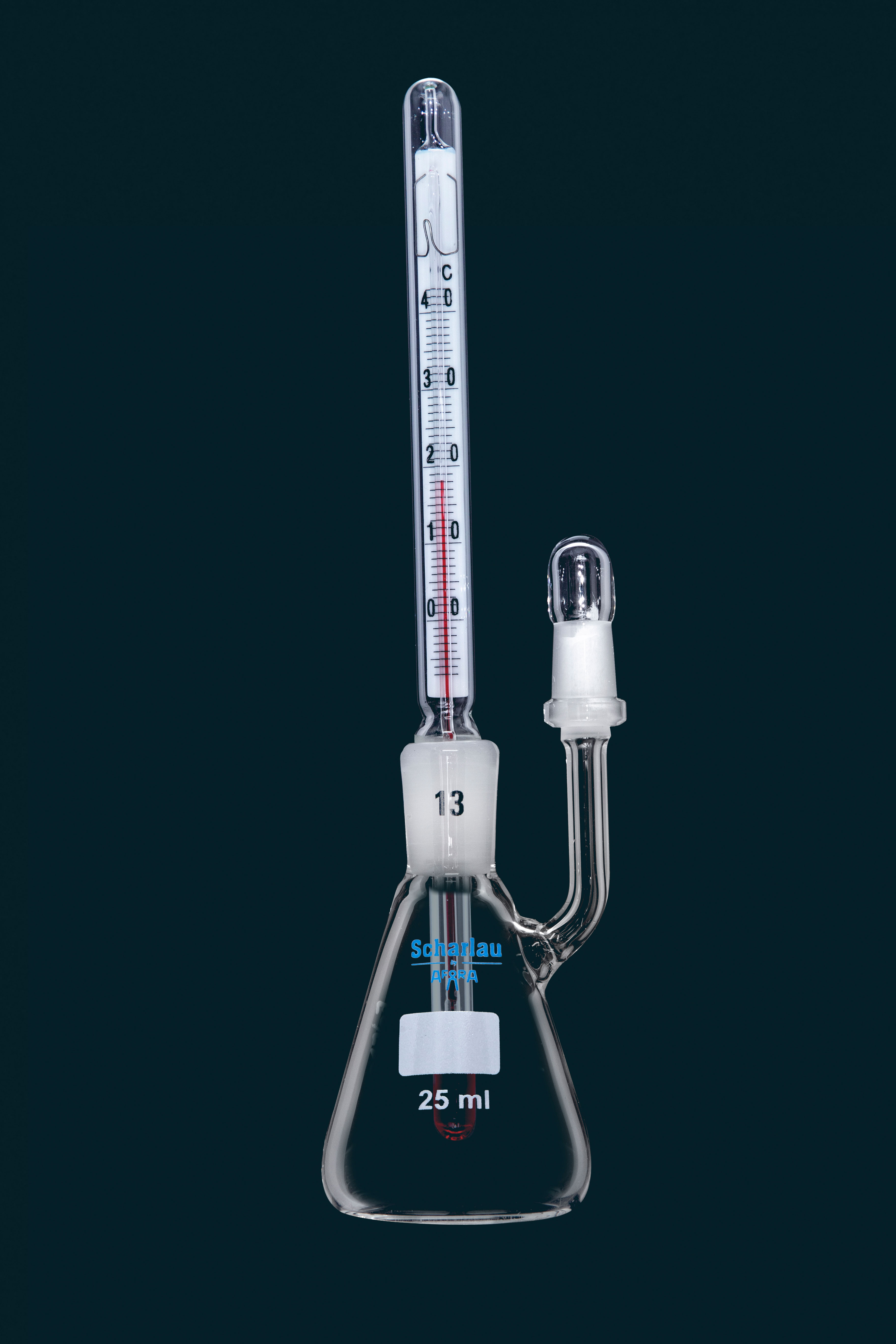 Glass pycnometer with thermometer filling liquid red, scale 0-40ºC ...