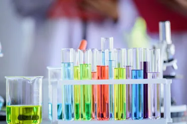 Test tubes with reagents and biochemical tests in a laboratory rack