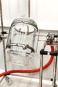 Reactor de vidrio en sistema de volteo